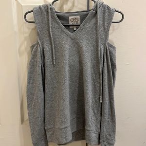 Long sleeve v neck with open shoulders and hood. Size xs